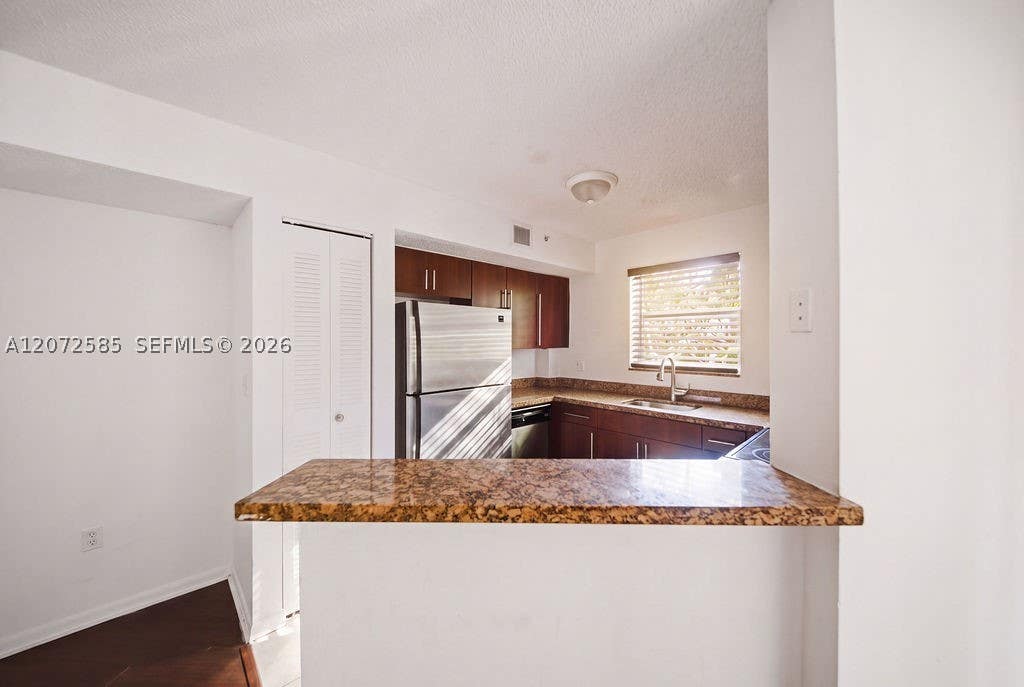 Photo of 771 N Pine Island Rd #205, Plantation, FL 33324 (MLS # A12072585)