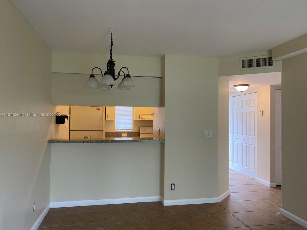 Photo of 10066 Twin Lakes Dr #5-C, Coral Springs, FL 33071 (MLS # A11343264)