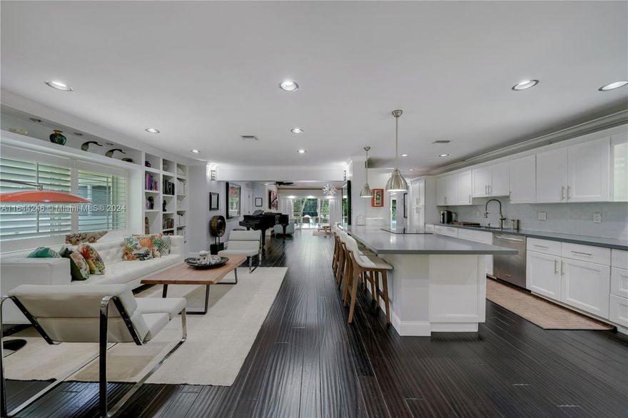 Turn-key Pinecrest home with 6 Bedrooms and 5 Baths on a sprawling acre lot. Spacious living areas complement the floor plan providing ample space for entertainment. This home was meticulously remodeled about 10 years ago including a metal roof, pvc plumbing, electrical, impact resistant windows/doors, kitchen, baths, bamboo floors, etc. Further upgrades include 2 5ton a/c units replaced in 2022, a whole home generator, and EV charging station. The gourmet kitchen with stainless steel appliances will delight any chef. Enjoy the lushly landscaped grounds while soaking in the sparkling pool or while playing pickle ball and basketball on the lit court. Add even more outdoor fun with the putting green, tree house, and trampoline. Oversized porte-cochere and 2 car garage for your convenience.