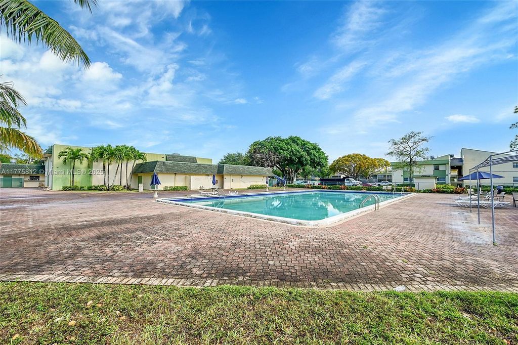 Photo of 4132 NW 88th Ave #203, Coral Springs, FL 33065 (MLS # A11775812)