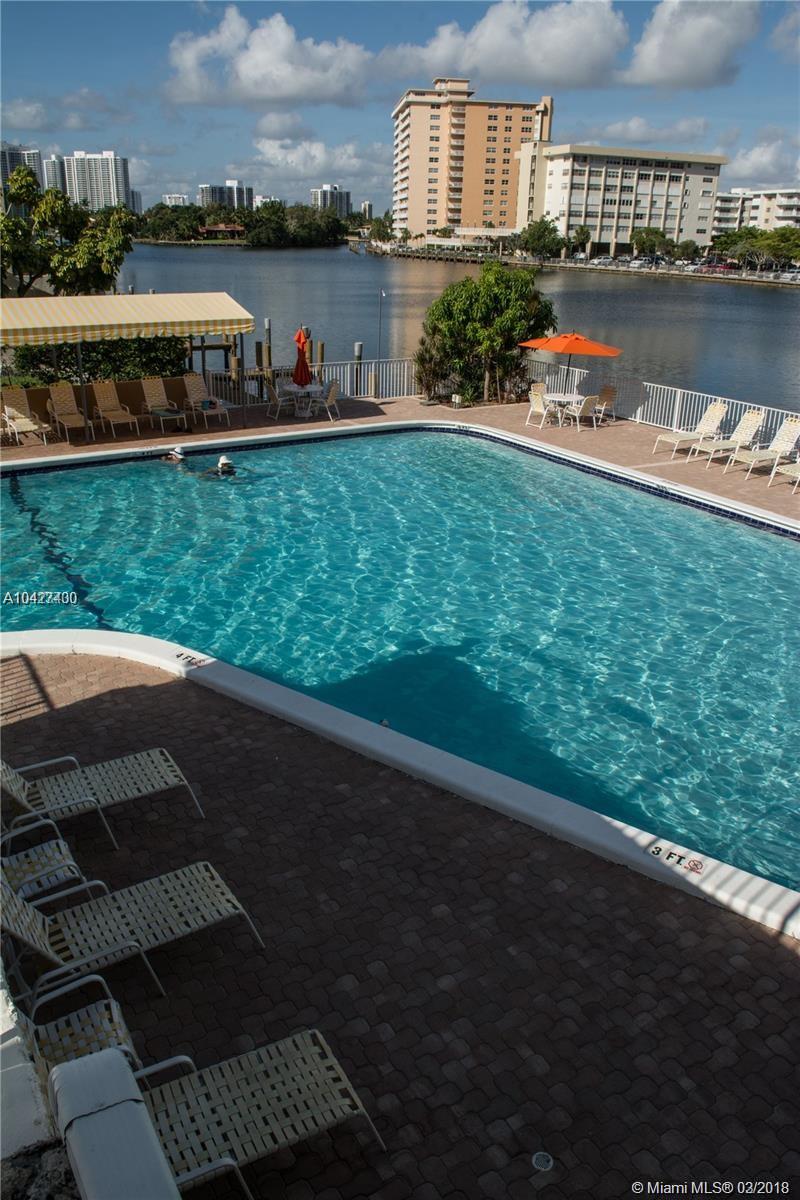 Don't miss the opportunity: remodeled unit. Eat-in kitchen, granite counter top, lots of natural light. Spacious 2 bedrooms/2 baths, ample closet space. A well-managed updated building secured gated community. Amenities include 24- hour patrol, security guard, heated pool situated on the Intercoastal, gym, sauna, billiards. A building is centrally located in the heart of Hallandale Beach, close to fine dining, retail shops, malls, airports and Gulfstream Village.