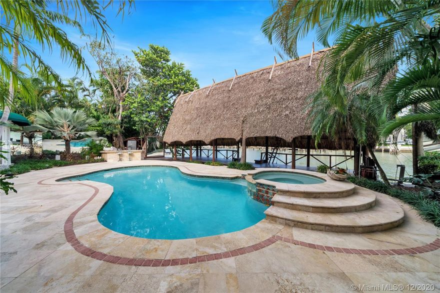 This 2-story Art Deco waterfront home on exclusive Pine Tree Drive is a must see. The 5BR/4+1BA home features fine marble floors, and sits on a lush 9,150 SF lot w/3,857 SF of interior space. Open large main living area overlooking the pool deck and 75 ft of waterfront. 3 bedrooms upstairs including the master suite and two balconies overlooking the pool & Intracoastal Waterway. 1 bedroom downstairs plus separate guest/in-laws quarters. Driveway can fit up to 10 vehicles. Great opportunity for Buyers looking to give it their personal touch and developers looking to flip or build new construction on the water. Conveniently located in the heart of Miami Beach.