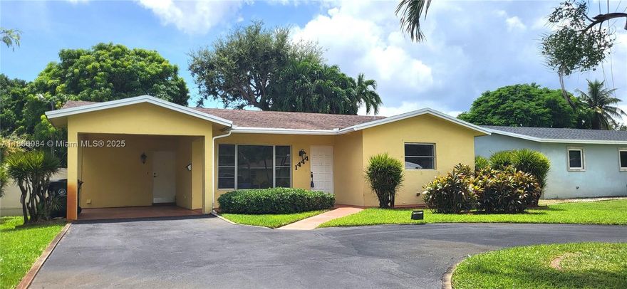 Charming 3BR/2BA Fort Lauderdale home combining Old Florida character with modern comfort. Bright, open layout with updated kitchen, neutral tones, and abundant natural light. Enjoy a lush private yard with fruit trees and a screened patio perfect for relaxing or entertaining. Features a circular driveway, a quiet street, and a prime central location near beaches, downtown, the airport, and Las Olas. Move-in ready, with spacious living areas, tropical landscaping, and a well-maintained appearance. Experience the perfect South Florida retreat—stylish, comfortable, and close to everything! Convenient access to top schools, shopping, dining, and major highways. Available for immediate move-in! Small Pets Allowed.