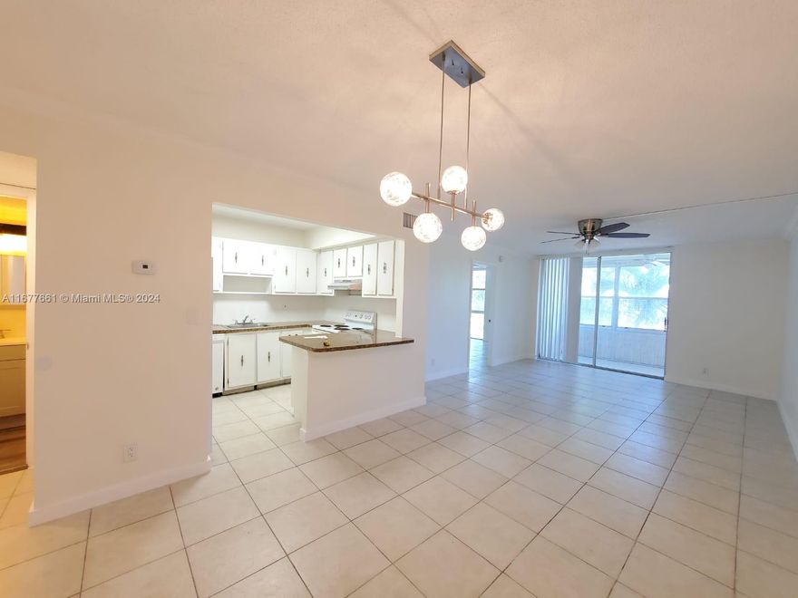 Remodeled unit, tiled throughout, all stainless steel appliances purchased new in 2022, brand new A/C installed in September 2023 with 10 years warranty, brand new water heated installed January 2024.  Rented to a Section 8 tenant with Broward Housing Assistance for $1,450 per month until 10/31/2025, which means guaranteed rent!. No age restrictions, can rent right away.  Great investment opportunity.  ***AGENTS SEE BROKER REMARKS***