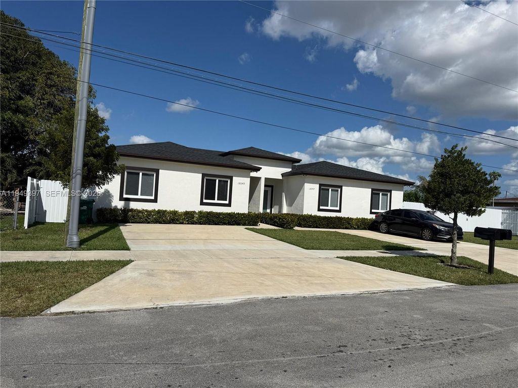 Photo of 12047 12049 SW 213th St, Miami, FL 33177 (MLS # A11949397)