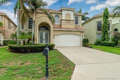 This spacious single-family residence offers 4 bedrooms, 3.5 bathrooms, and is perfectly situated on a serene, navigable lake—ideal for kayaking, paddleboarding, or enjoying peaceful rides on battery-operated boats. Located in a secure, gated community, this property combines luxury and lifestyle with tranquil water views, generous living spaces, and excellent community amenities. Ideal for buyers looking to update or remodel to their taste, cash only, subject to bank approval
