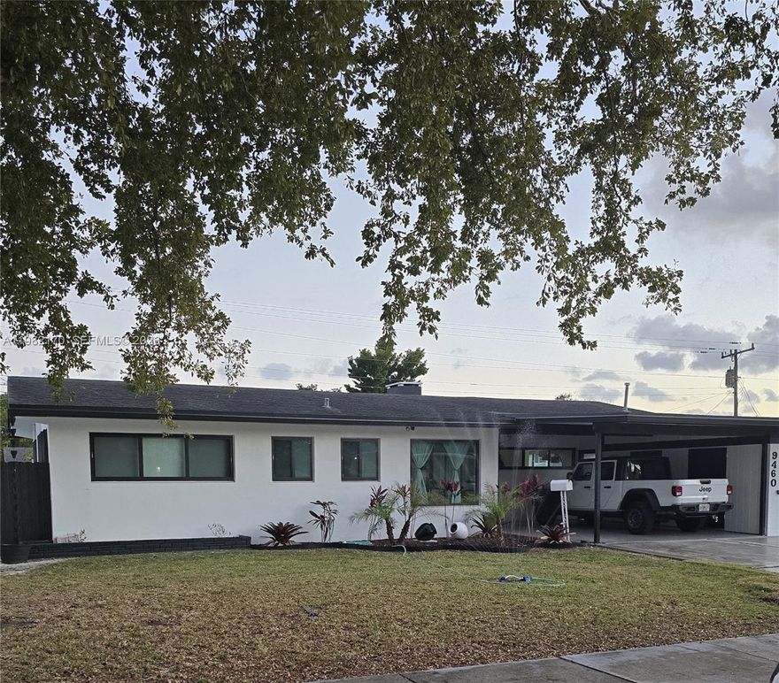 Stunning 3-bedroom, 2-bathroom home featuring immaculate terrazzo floors and impact-resistant windows.
It boasts an open-concept kitchen, a brand-new driveway with an electric vehicle (EV) charging station, and a massive 8,250-square-foot lot complete with a pergola. No HOA, No CDD, and no flood insurance required. Move-in ready! Space for a boat and more
This won’t last!