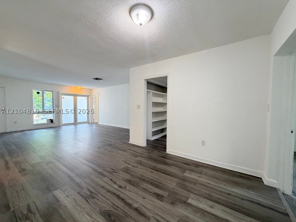 Photo of 8590 NW 25th Ct, Sunrise, FL 33322 (MLS # A12104819)