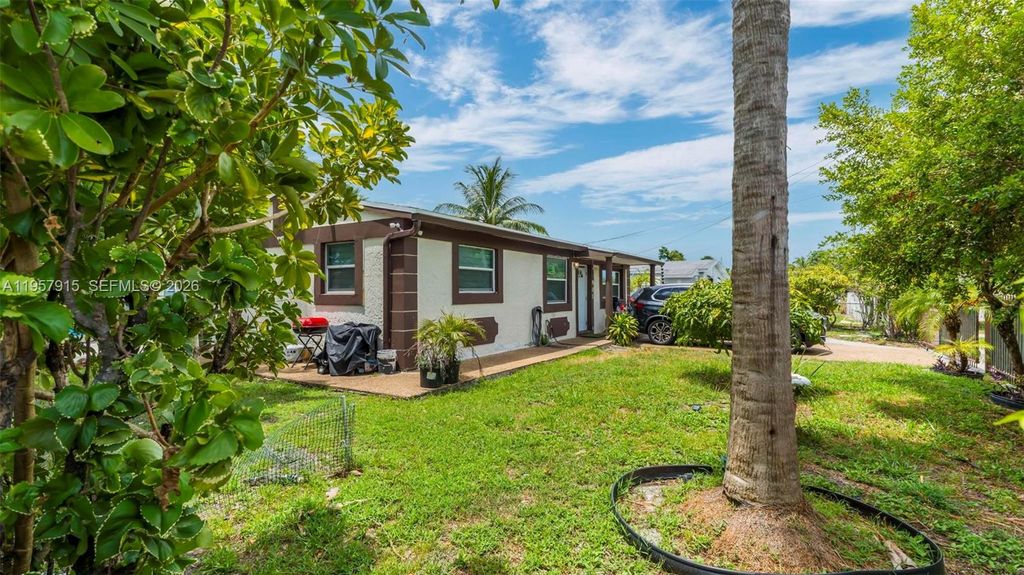 Photo of 901 NW 34th Ter, Lauderhill, FL 33311 (MLS # A11957915)