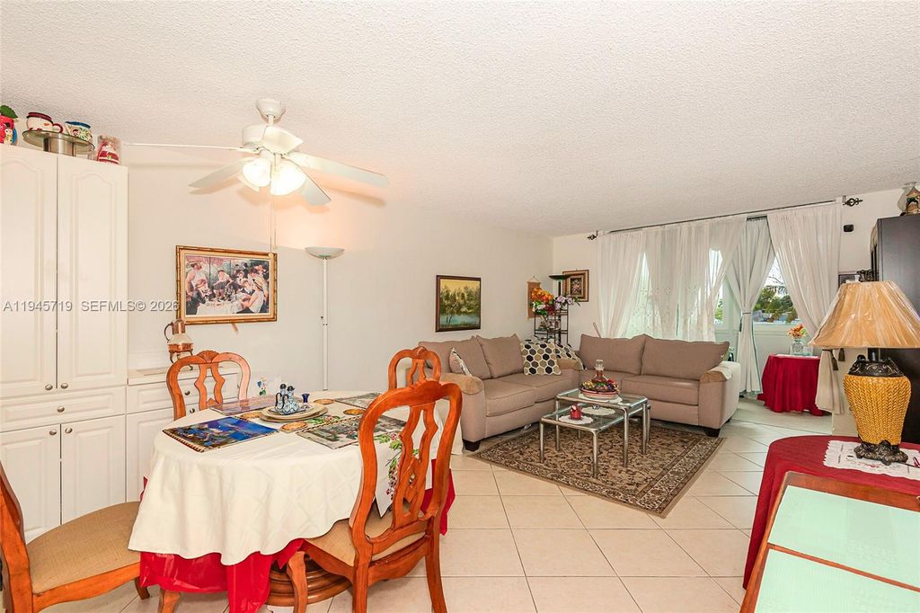 Photo of 9660 Sunrise Lakes Blvd #202, Sunrise, FL 33322 (MLS # A11945719)