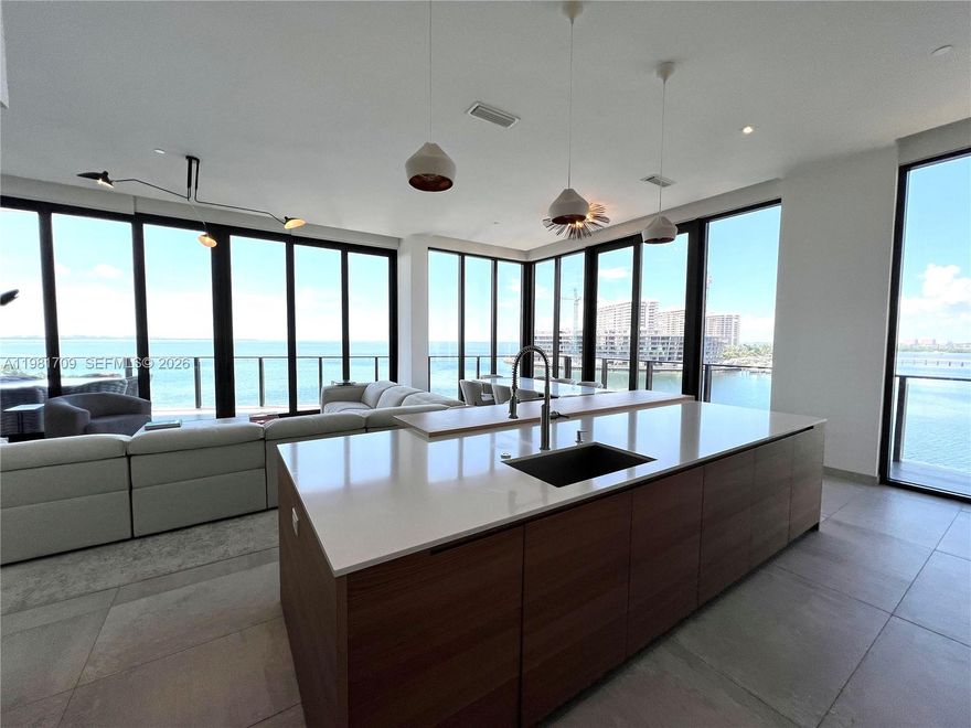 Expanding 3200 sq ft. of interior space. 4 bedrooms, 5 1/2 bathroom plus, maid's quarters. Amazing views of the
bay from every room. 12.9 feet ceiling height, floor to ceiling windows. Private elevator. Custom upgrades,
Dornbracht fixtures, Duravit toilet and bidet, Poliform cabinetry & closets, Crestron lighting/AC system, Parking for
3 cars. The Fairchild is a full service & amenities building. Concierge, Porter, Valet parking, Fully equipped gym,
Holistic spa with Hammam, steam and sauna, treatment rooms, roof-top pool w/cabanas, summer kitchen, grill
area. Outdoor cinema. Boat slip available. Lush landscape throughout inspired by David Fairchild's private garden.