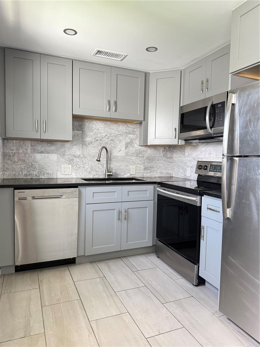 Fully remodeled 2-bedroom, 1.5 bathroom condo for rent in Boca Raton. Modern finishes throughout, including updated kitchen, bathrooms, and flooring. Spacious layout with plenty of natural light. Located in a quiet and secure neighborhood. Community offers clubhouse, pool, and fitness center. Conveniently close to shopping, dining, and major roads. Association approval required. Cable TV and internet included as provided by Condo Association, with Assigned parking and guest parking