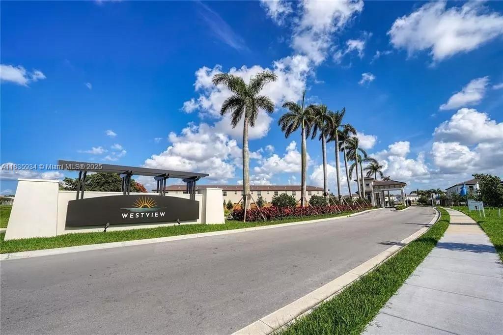 This beautiful 3-bedroom, 2.5-bath home boasts a modern design, open-concept living, and lovely finishes throughout. Enjoy a private backyard and two dedicated tenant parking spaces, plus convenient guest parking. Nestled in a prime location near shopping, the airport, and major routes, this home offers the perfect blend of comfort, style, and convenience. The gated community provides jog paths, enhanced security, lush landscaping, and brand-new, gorgeous amenities including a clubhouse, resort-style pool, state-of-the-art fitness center, and a kids' play area.