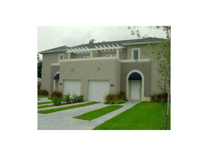 Gorgeous Town home tastefully developed w/hurricane resistant windows & doors. Walk in to the beautiful travertine marble floors; kitchen has granite countertops, clean white solid wood cabinets and stainless steel appliances. EACH UNIT has large private fenced backyard, plus ONE car garage and more!