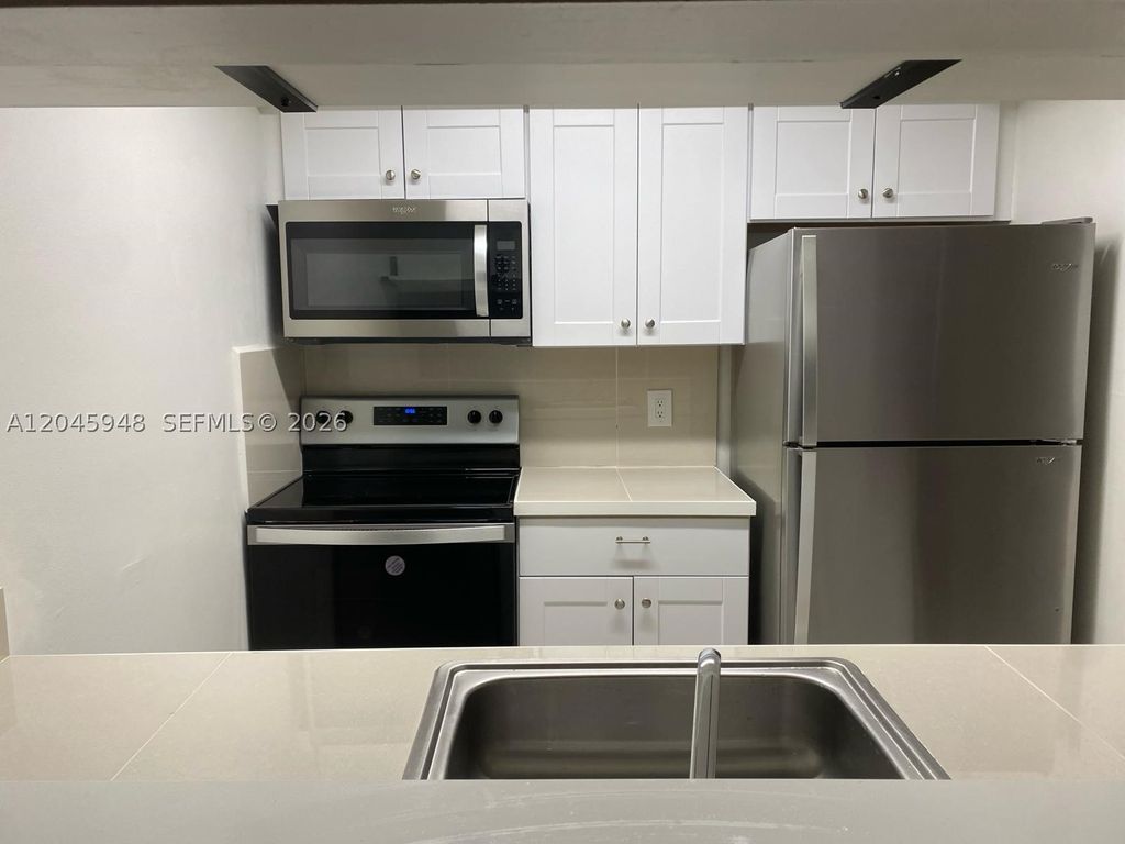 Photo of 5612 Rock Island Rd #167, Tamarac, FL 33319 (MLS # A12045948)