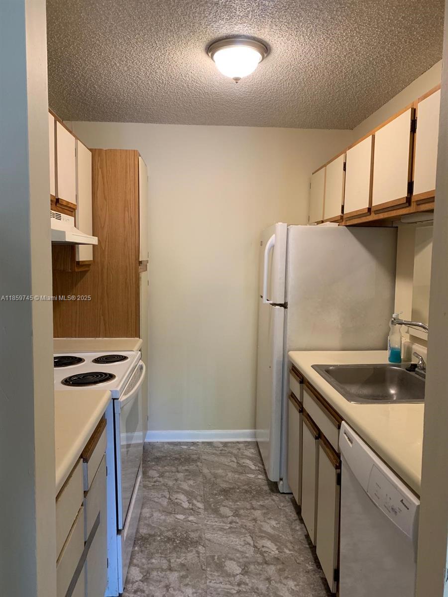 PALM AIRE GARDENS CONDO - Residential Lease