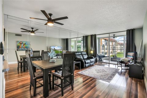 Photo of 2741 N Pine Island Rd #208, Sunrise, FL 33322 (MLS # A11883891)