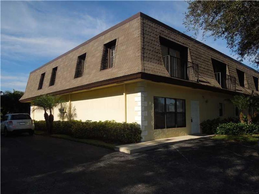 Located in Chateau on the Knoll this 2 bedroom 2.5 bath corner townhome that backs up to Boca Dunes Golf Course, features tiled floors throughout, freshly painted, open floor plan with spacious living room, dining room and open kitchen. Bedrooms upstairs,  master bath with whirl pool tub and large walk-in closet. Both bedrooms have balconies overlooking garden area and community pool. Centrally located close to shopping, good schools and main roads. This is Fannie Mae Homepath Property!