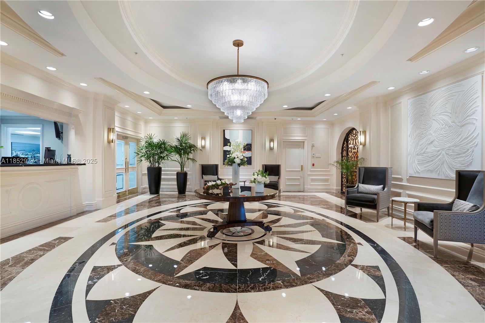 Located in the prestigious Ritz-Carlton Residences in Coconut Grove, this beautifully renovated corner unit offers refined living in a prime location. The two-bedroom residence features a thoughtfully designed split floor plan and gleaming marble floors throughout the main living spaces. The generous primary bathroom is appointed with double vanities, a water closet, and a separate soaking tub and shower. Residents enjoy access to world-class amenities, including two pools, a full-service spa, fitness center, on-site restaurant, club lounge, room service, 24-hour concierge, and both assigned and valet parking. Just moments from Coconut Grove’s acclaimed dining, shopping, and entertainment destinations.