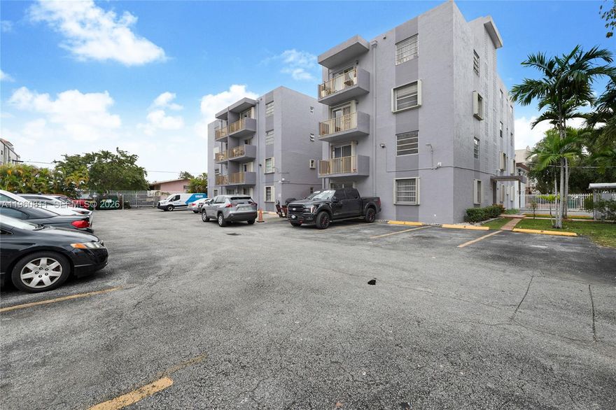 In the heart of Miami! Beautiful top-floor corner unit substantially remodeled and filled with natural light, offering views of the pool and Marlins Stadium. Located in a gated community with access through an electric gate to your assigned parking space. Kitchen features white cabinetry, brand-new quartz countertops and quartz backsplash, plus a new undermount sink. Freshly painted interior with bright open living area. Two spacious bedrooms with new blackout shades and impact windows. Enjoy a well-maintained community with pool, laundry room, new roof, and new elevator. Prime location near Downtown, Brickell, highways, schools, shopping, restaurants, and just 15 minutes to MIA.