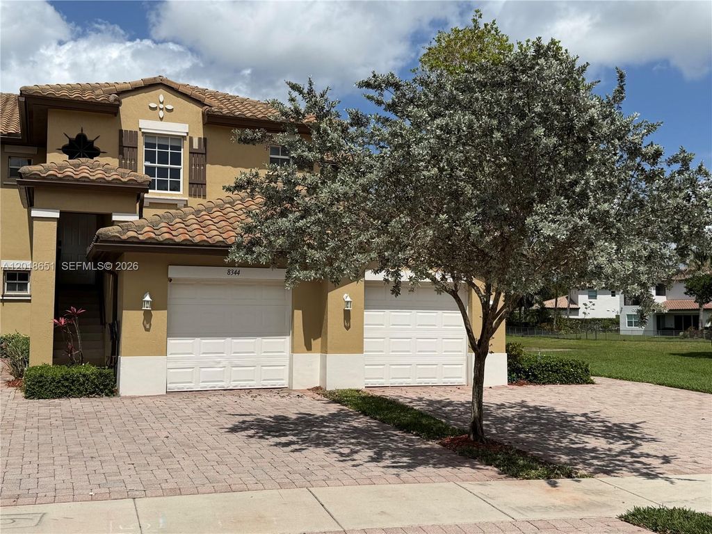 Photo of 8344 NW 127th Ln #26-F, Parkland, FL 33076 (MLS # A12018651)