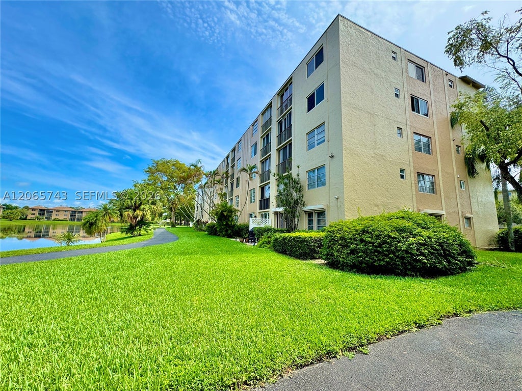 Photo of 7840 NW 50th St #102, Lauderhill, FL 33351 (MLS # A12065743)