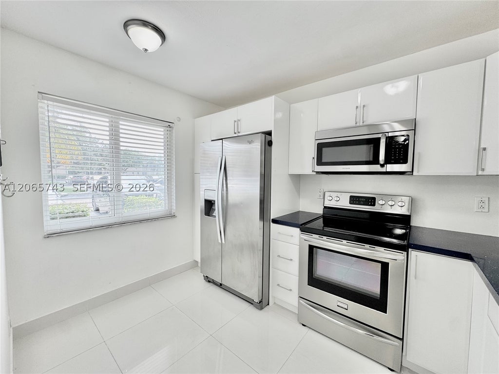 Photo of 7840 NW 50th St #102, Lauderhill, FL 33351 (MLS # A12065743)