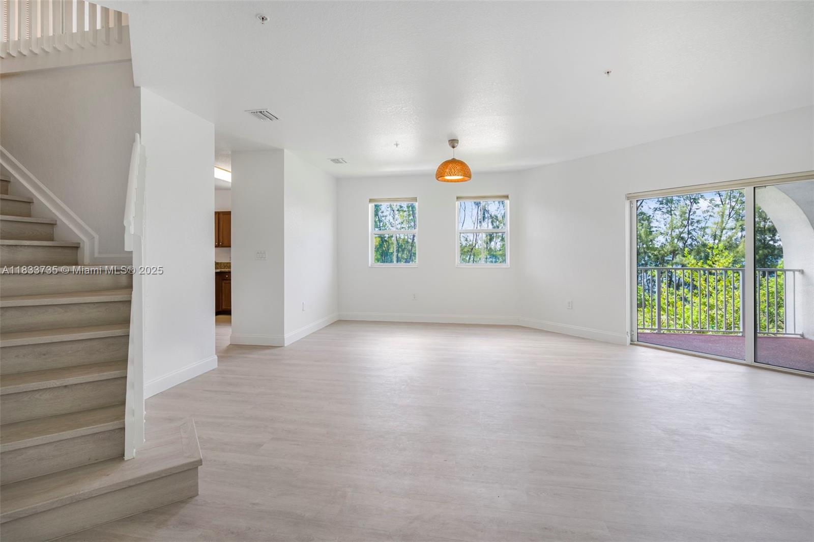 Remodeled & Spacious 2-story 3 bed / 2.5 bath corner unit in St. Maarten at Grand Bay, Doral. Largest layout in the building with 1,573 sqft. Enjoy a bright, open floor plan with lagoon views from every window, a large balcony, and plenty of natural light. Features include stainless steel appliances, granite countertops, wood cabinets, Laminate floors, full-size washer/dryer, and 2 parking spaces. Gated community with 24/7 security. Access to Grand Bay Clubhouse with resort-style amenities: pool, cabanas, kids' water park, fitness center, tennis, basketball, BBQ area, and more. A+ rated schools nearby.