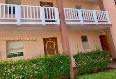 Photo of 9601 Sunrise Lakes Blvd #106, Sunrise, FL 33322 (MLS # A11932763)