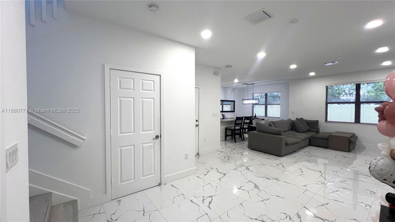 This stunning 3-bedroom, 2-bath home offers the perfect blend of comfort and modern elegance. Located near a serene lake, the property features upgraded flooring throughout, creating a warm and contemporary feel. The backyard is fully upgraded with premium landscaping, ideal for relaxing or entertaining guests. Inside, you’ll find a spacious kitchen equipped with top-of-the-line appliances, making it a chef’s dream. This home truly combines style, functionality, and a peaceful setting.
