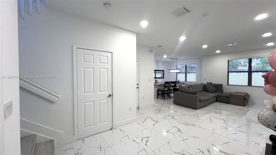 This stunning 3-bedroom, 2-bath home offers the perfect blend of comfort and modern elegance. Located near a serene lake, the property features upgraded flooring throughout, creating a warm and contemporary feel. The backyard is fully upgraded with premium landscaping, ideal for relaxing or entertaining guests. Inside, you’ll find a spacious kitchen equipped with top-of-the-line appliances, making it a chef’s dream. This home truly combines style, functionality, and a peaceful setting.