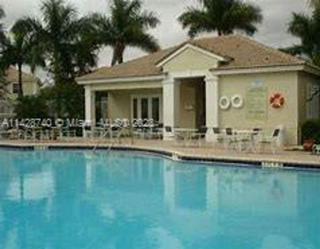 Photo of 316 SW 120th Ave, Pembroke Pines, FL 33025 (MLS # A11428740)