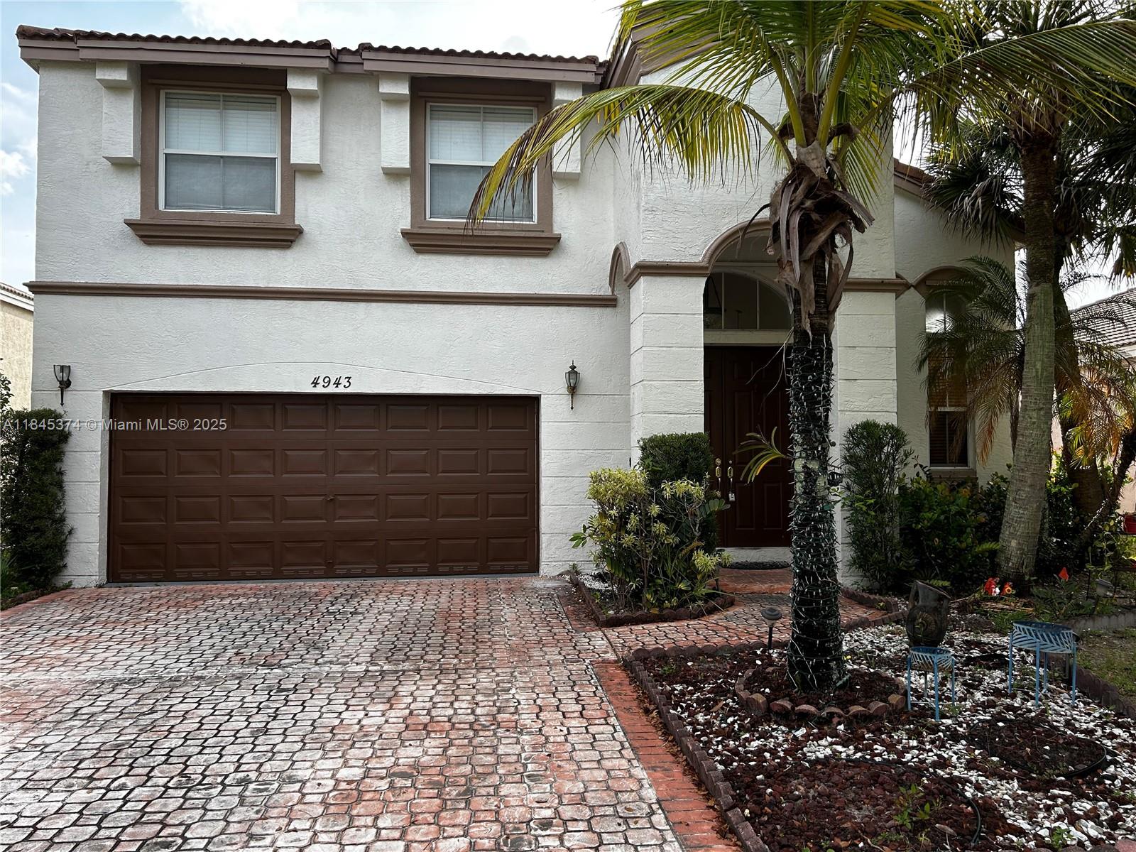 Beautiful home in sought after Riviera Isles Community in Miramar. This multilevel house features 3 bedrooms and two full bathrooms upstairs, one bedroom and one full bathroom downstairs. Amazing lake views for your enjoyment and a two car garage plus extra parking space in driveway. A resort style clubhouse tops off this property with tennis courts, great pools, basketball courts, playground, and many more amenities. Do not hesitate to call this your home. More pictures to come!