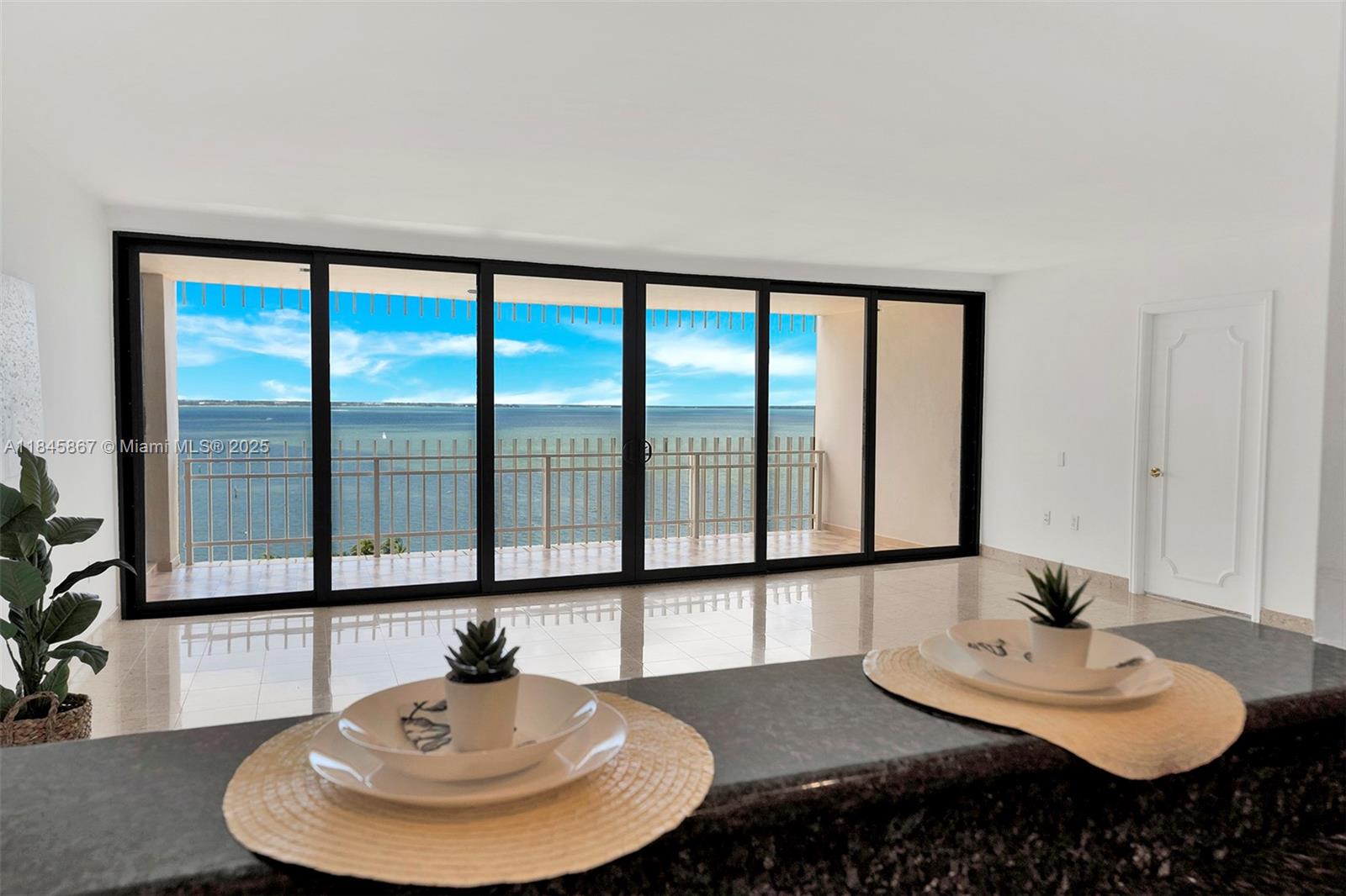 Live on a private island with amazing views of the Miami bay and skyline from this 11th floor condo. Community features security, valet, library, pool, gym and other amenities. **Construction currently on site and estimated to last at least 6 more months**