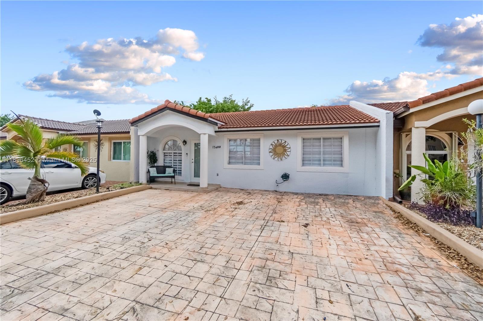 View photos, virtual tours, details... 17400 NW 76th Ct