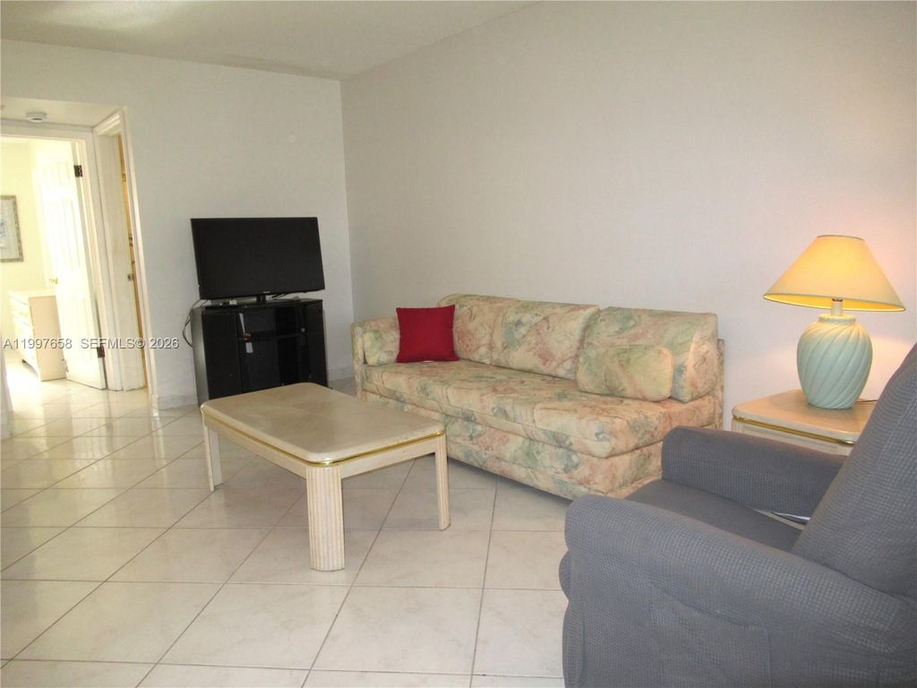 Photo of 580 Egret Dr #214, Hallandale Beach, FL 33009 (MLS # A11997658)