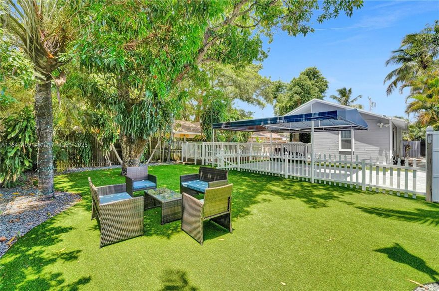 A rare gem in the heart of Fort Lauderdale - elegantly updated on a lush, oversized corner lot minutes from Las Olas, Flagler Village & the beaches offering the perfect blend of privacy, sophistication & urban convenience. Upgraded for peace of mind and modern living, featuring a new main roof (2023), new flat roof (2022), new electric panel (2025) and impact windows and doors (2017). The fully fenced yard is a private oasis, enhanced with premium turf under warranty, lush landscaping and ample space for entertaining. Inside, charm meets functionality with a decorative fireplace, library or office space and a Rain Soft whole-house water system. Whether you're seeking a serene retreat or a home base near Fort Lauderdale’s best dining, arts & waterfront attractions, this property delivers!