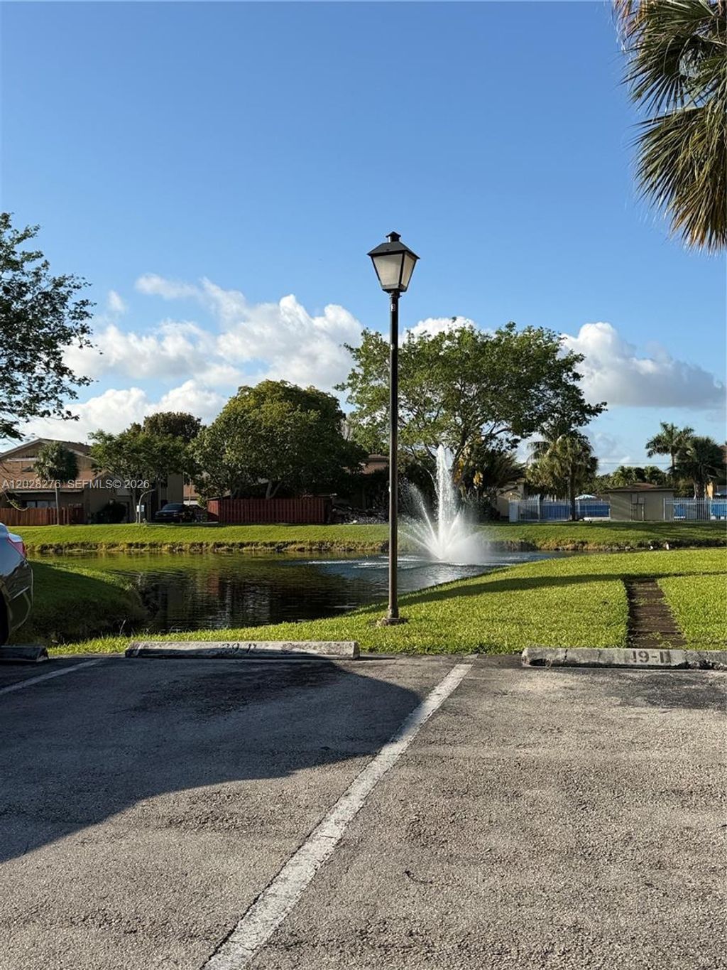 Photo of 8330 N Missionwood Cir #B-23, Miramar, FL 33025 (MLS # A12028276)