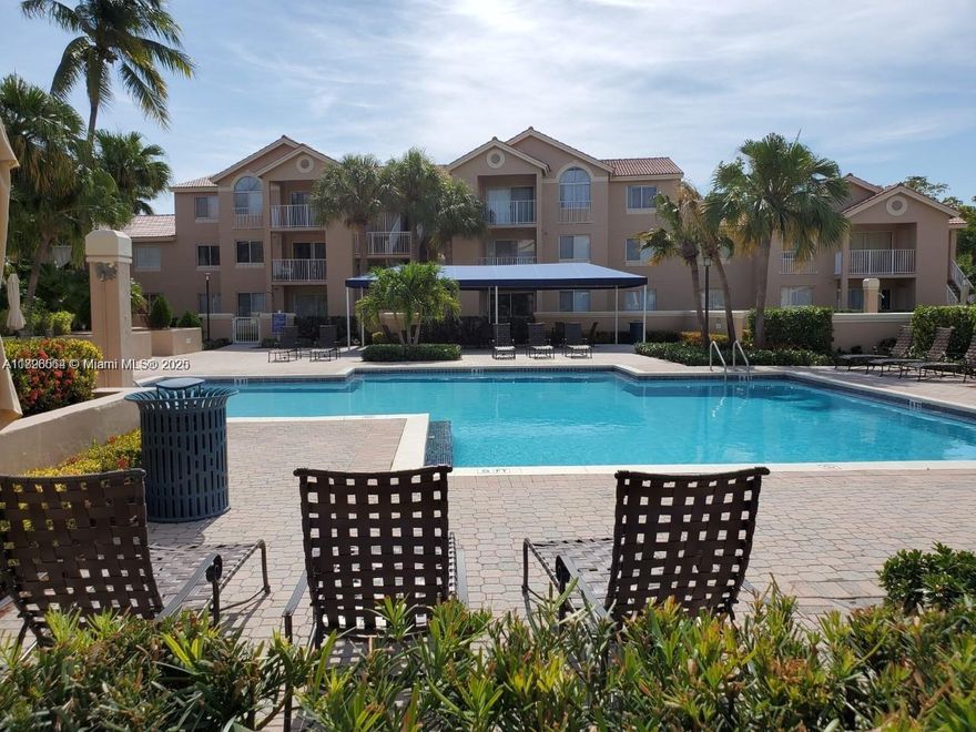Spacious 2 bedroom, 2 bath condo in the desirable Royal Palm Place at The Hammocks. Freshly painted, tile floors throughout , SS appliances, washer and dryer inside. This gorgeous gated community offers tennis/basketball courts, pools, jacuzzi, BBQ area, playground, large green areas and gym. Residents can also enjoy all the great amenities that the Hammocks Master community has to offer including: beautiful walking and biking trails, nature and Lake views, Tennis, Volleyball and Basketball Courts, party rentals and more