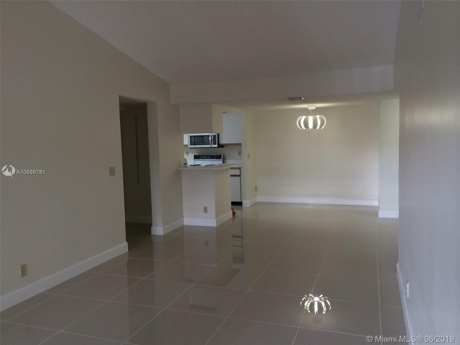 BEAUTIFUL 2/2 - STUNNING VIEW, clean, renovated and wood/ tile flooring. COME AND SEE, THIS WILL NOT LAST! Near A school and main highways.