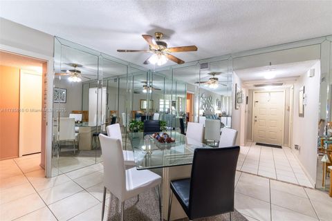 Photo of 4221 W Palm Aire Dr #203, Pompano Beach, FL 33069 (MLS # A11785616)