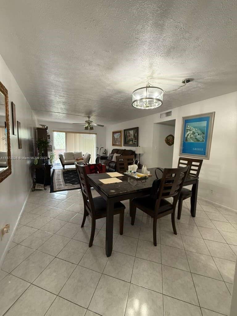 THIS PROPERTY HAS WASHER/DRYER RIGHT IN FRONT OF YOUR DOOR, AND ELEVATOR, THE A/C IS 5 YEARS OLD AND WATER HEATER 2 YEARS OLD. 1 PARKING SPACE, BUT THERES ALOT OF GUEST PARKING.