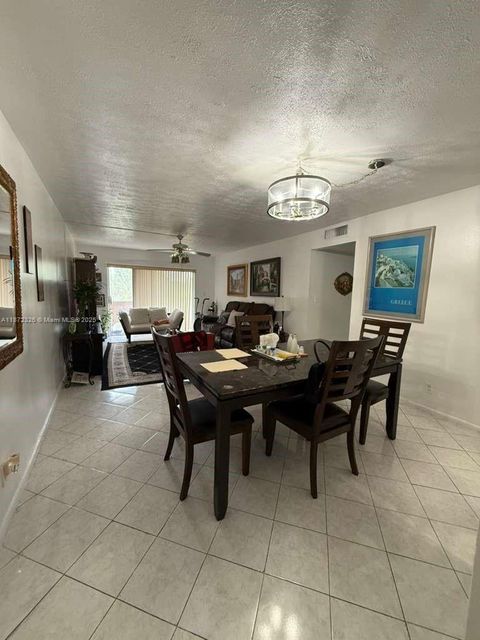 Photo of 1200 Tallwood Ave #305, Hollywood, FL 33021 (MLS # A11872326)