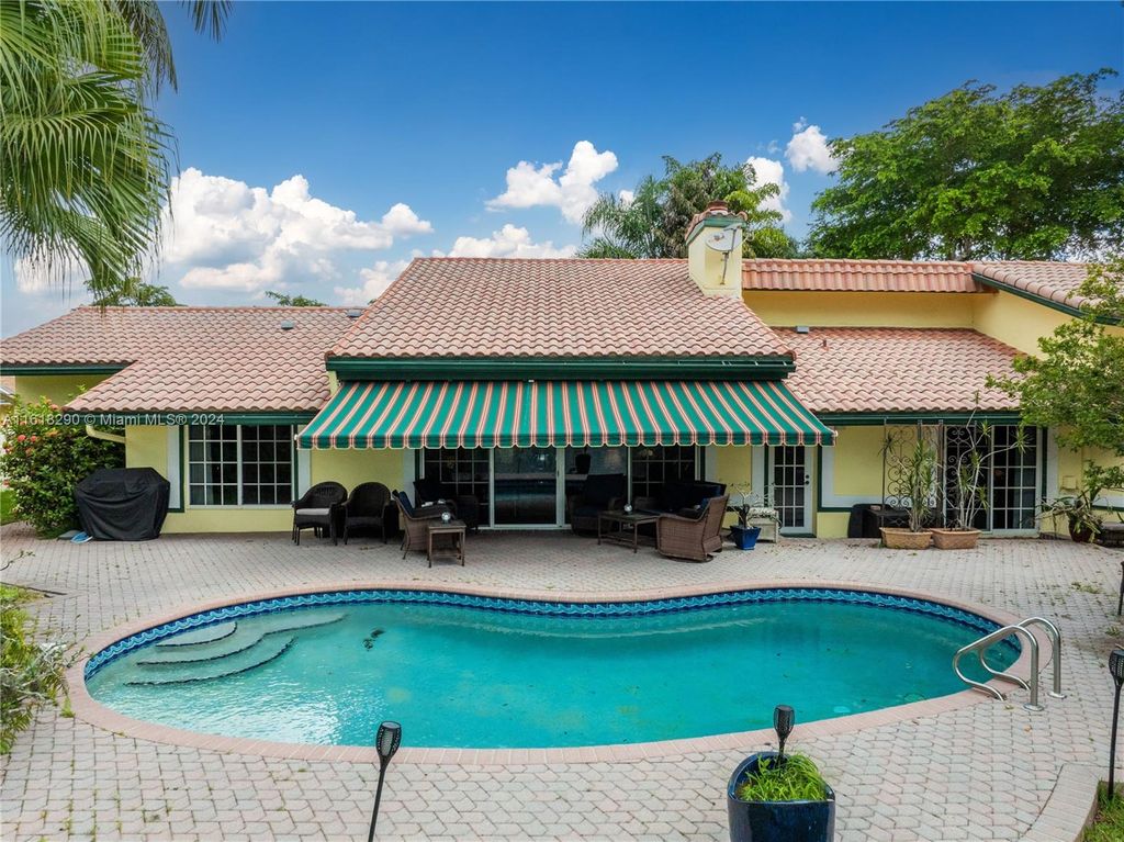 Photo of 9890 SW 2nd St, Plantation, FL 33324 (MLS # A11618290)
