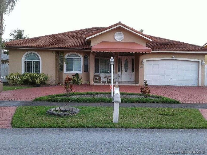 Beautiful  home ,3 bedrooms and 3 bathrooms, tile floor,  fenced yard, circular drive way , carport, two car garage ,Jacuzzi,  well located  neighborhood ,two new central air conditioners ,washer and dryer.