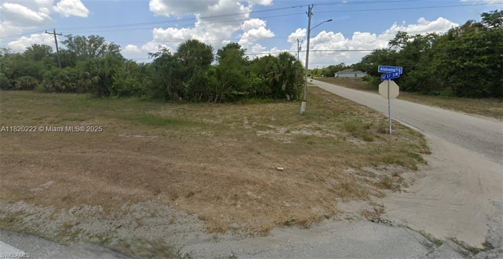 Quarter-acre lot located on the corner of 52nd Street SW and Alabama, with convenient access to SR 82. Situated in the heart of Lehigh Acres, this property is in close proximity to town and surrounded by new construction developments. Dont miss out on this prime location.