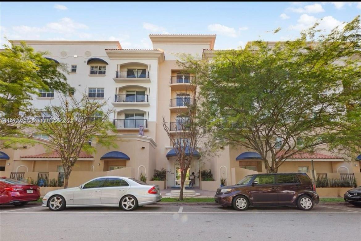 Located in a boutique building just a few blocks from the world-renowned Miracle Mile, this luxurious 3-bedroom, 2-bath residence offers upscale living within walking distance to premier restaurants, charming shops, and top-rated schools. The condo is in pristine, like-new condition and features travertine marble floors, granite countertops, stainless steel appliances, and European-style wood cabinetry in the kitchen. Soaring 9-foot ceilings enhance the sense of space, while two private Lanai balconies provide the perfect spot to unwind. The expansive primary suite boasts a spa-inspired bathroom with dual vanities, a travertine shower, a deep soaking tub, and a bidet. Generous storage includes a large walk-in closet, two linen closets, and a full-sized utility room with washer and dryer.