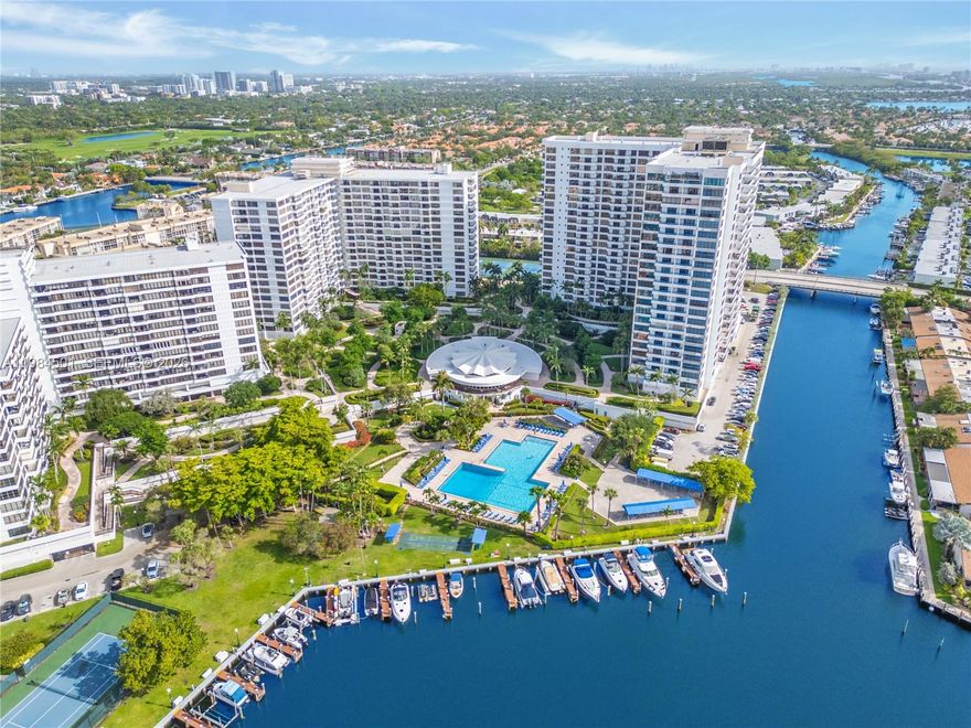 TRANQUIL WATERFRONT CONDO RESIDENCE. DIRECT VIEWS OF THE CANALS AS THE BOATS PASS BY FROM YOUR PRIVATE OPEN BALCONY. THIS SPACIOUS OPEN CONCEPT KITCHEN IS IDEAL FOR ENTERTAINING. SPACIOUS PRIMARY BEDROOM OFFERS EXCELLENT STORAGE WITH LARGE WALK IN CLOSETS FOR ADDED STORAGE. SEPARATE BUILT IN DESK AREA IS PERFECT TO  WORK FROM HOME. AFFORDABLE LUXURY LIVING WITHIN MINUTES TO THE BEACH. OLYMPUS OFFERS OVER 18 ACRES OF RESORT STYLE LIVING. AMENITIES INCLUDE TWO LUSHLY LANDSCAPED POOL, 5 TENNIS COURTS, MARINA, BBQ AREA OVERLOOKING THE WATER. MULTI MILLION DOLLAR CLUB HOUSE INCLUDES STATE OF THE ART FITNESS CENTER, YOGA ROOM, SELF-SERVICE CAFE, SAUNAS AND LOCKE ROOMS. IDEAL LOCATION WITHIN WALKING DISTANCE TO SHOPPING, RESTAURANTS AND ENTERTAINMENT.