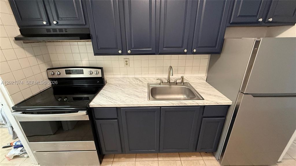 Photo of 4940 SW 28th Ter #S, Dania Beach, FL 33312 (MLS # A12021374)
