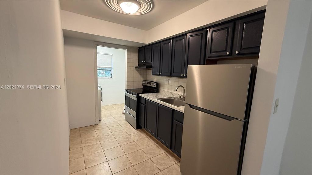 Photo of 4940 SW 28th Ter #S, Dania Beach, FL 33312 (MLS # A12021374)